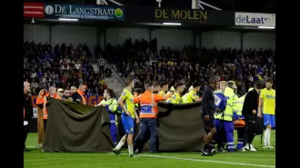 Goalkeeper Vaessen is conscious in hospital after a collision that caused the Ajax-RKC Waalwijk match to be abandoned.