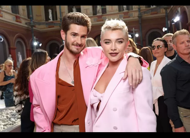 Florence Pugh and Andrew Garfield were spotted having fun at the Valentino Paris Fashion Week show.