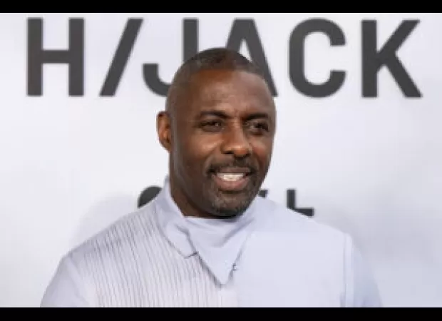 Idris Elba talks about his workaholic habits and how therapy helps him manage them.
