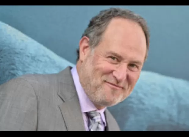 Director Jon Turteltaub discusses Disney's Jamaican accent controversy on the 30th anniversary of 'Cool Runnings'.