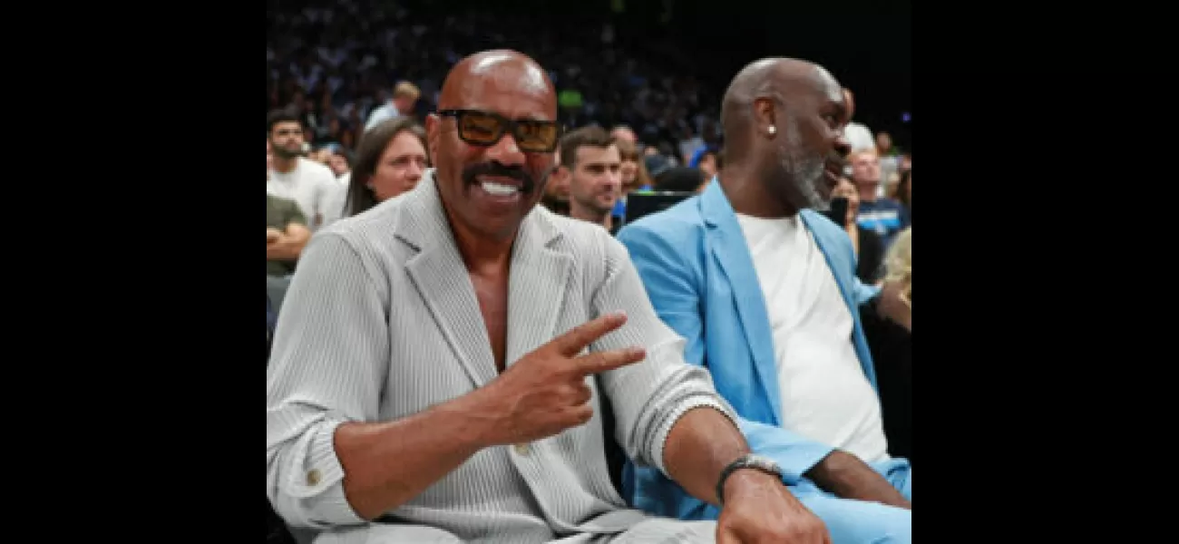 Michael B. Jordan and Steve Harvey embraced at an NBA game, a year after Michael's breakup with Lori Harvey.