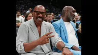 Michael B. Jordan and Steve Harvey embraced at an NBA game, a year after Michael's breakup with Lori Harvey.