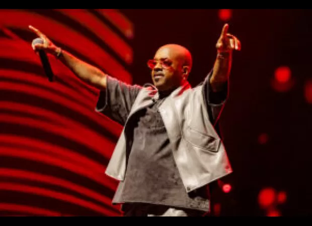 Jermaine Dupri celebrates 25th anniversary of So So Def on an Atlanta MARTA bus.