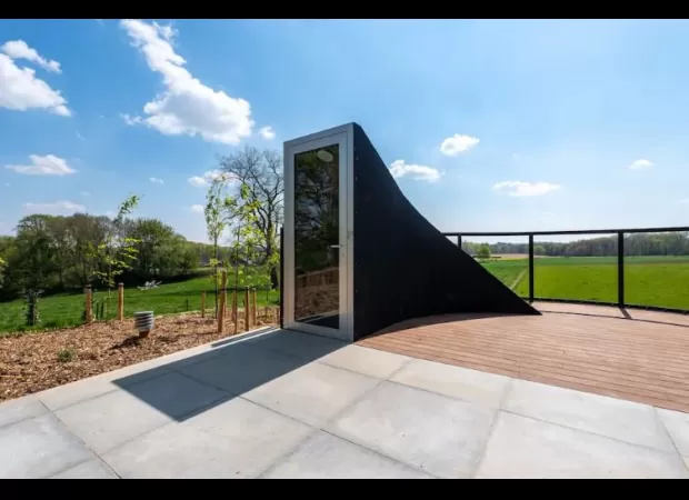 Futuristic door opens to an amazing Airbnb space.