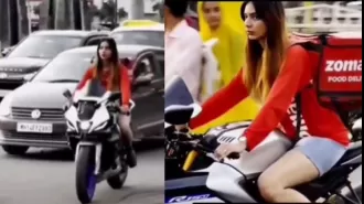 Netizens demand police action after video of Zomato delivery girl riding without a helmet goes viral.