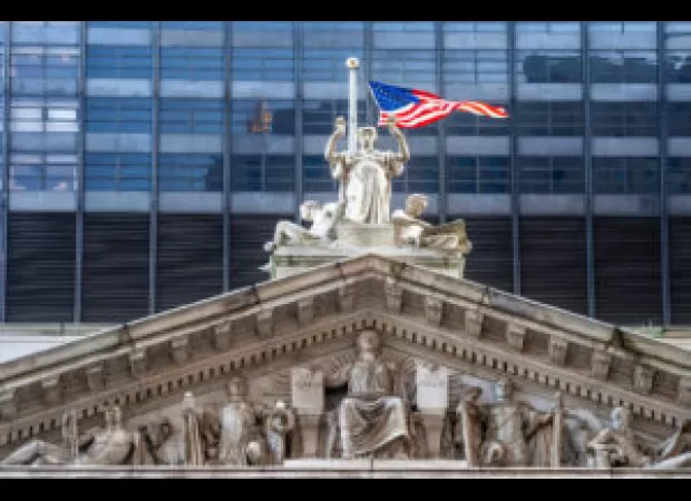 Judge fired after brandishing gun at Black man in court.