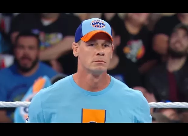 John Cena fights back tears while saying goodbye to WWE.