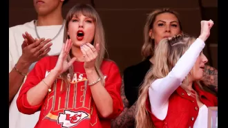 Taylor cheers on bf Travis at his game, going wild with excitement.