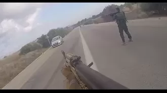 Hamas gunmen celebrated as they fired at civilians in a new video of the massacre.