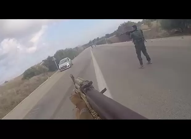 Hamas gunmen celebrated as they fired at civilians in a new video of the massacre.