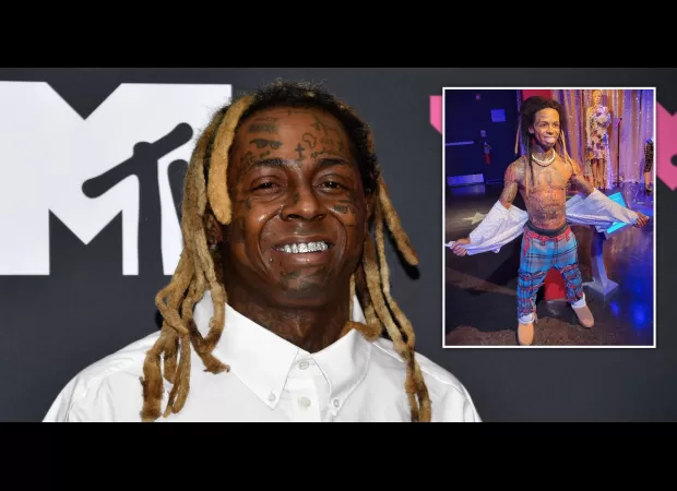 Lil Wayne shocked by odd wax figure of himself.
