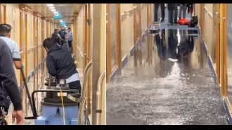 Passengers on cruise ship experience flooding hallway, like the Titanic disaster.
