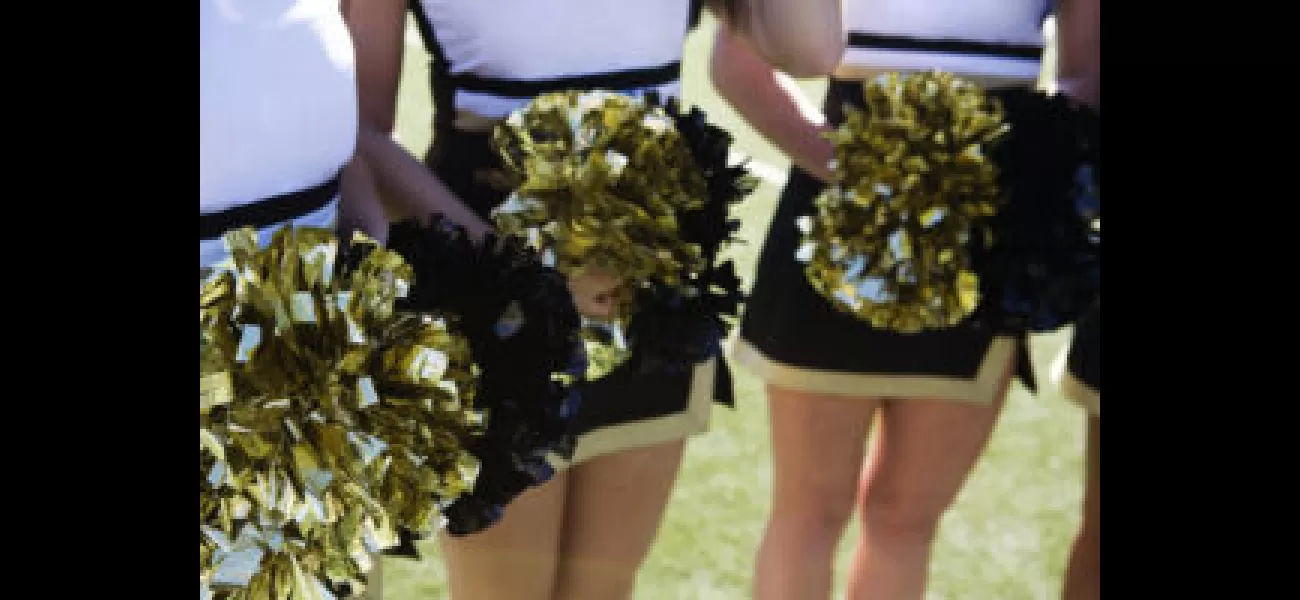 Dad in Texas shows support for daughter's cheer team by dancing with them, video goes viral on TikTok.