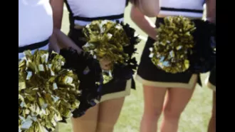 Dad in Texas shows support for daughter's cheer team by dancing with them, video goes viral on TikTok.