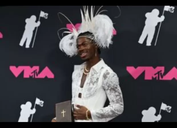 Lil Nas X criticized for wearing a costume seen as misogynistic and disrespectful.