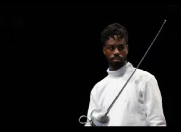 Fencer Curtis McDowald suspended due to misconduct allegations, impacting Olympic dreams.