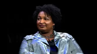 Stacey Abrams says opposing Trump doesn't make someone a hero; it takes more than that.