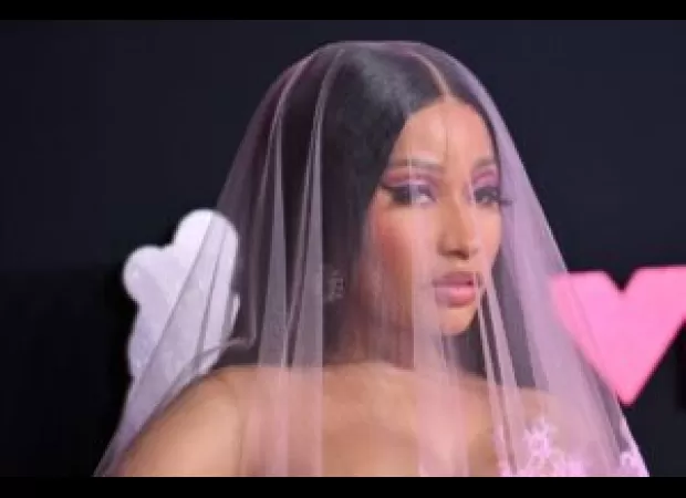 Nicki Minaj asks fans not to threaten anyone on her behalf.