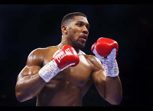 Anthony Joshua remembers a time he took on 6 men alone after getting food and talks about his boxing future.