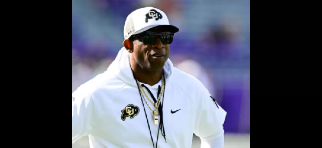Deion Sanders sets Guinness World Record with a massive football lesson to aspiring coaches.