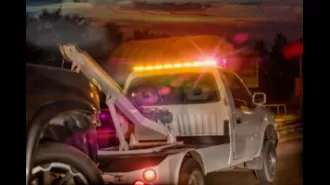 Tow truck driver repossesses car after police shoot a dying man, video shows.