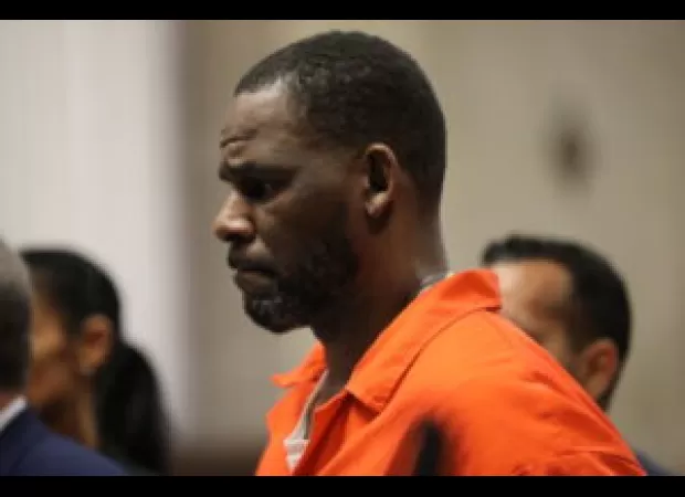 R. Kelly sues blogger and prison bureau over alleged leak of private records.