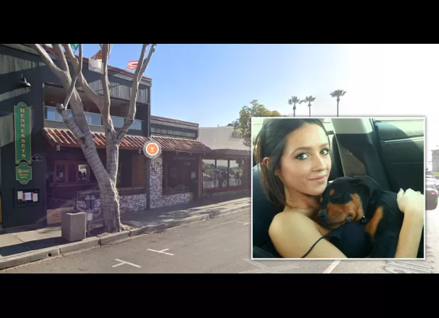 Woman's body found behind movie theater and restaurant she was employed by.