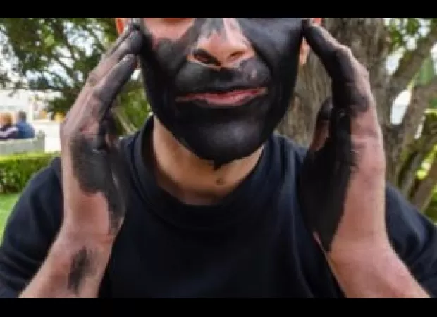 Student banned from sports over alleged blackface incident; family claims innocence.