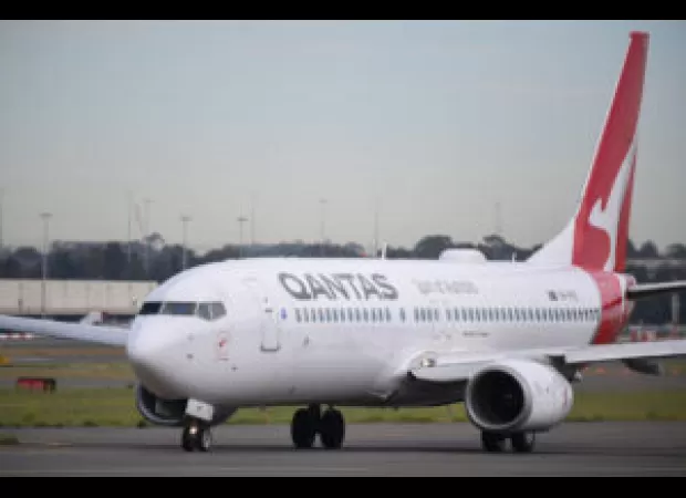 Woman arrested for attempting to board missed flight by running onto tarmac.