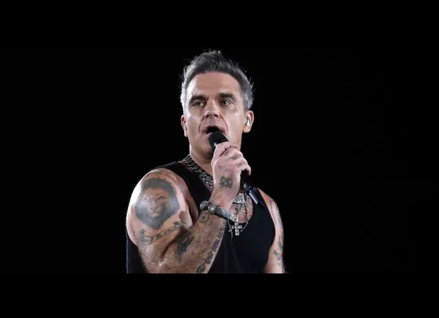 Sisters wanted to show their appreciation for Robbie and his music by flashing their boobs.