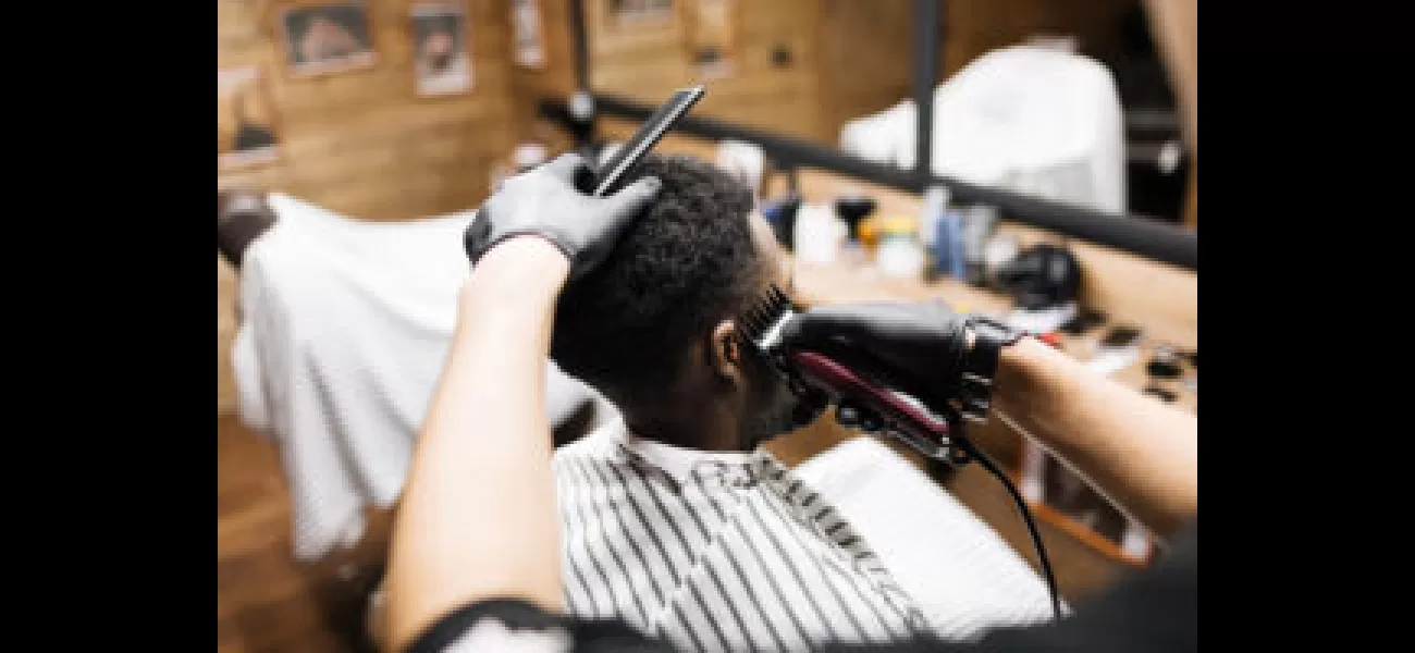 Owner of Akron barber college believes denial of funding is driven by racial and political motives.