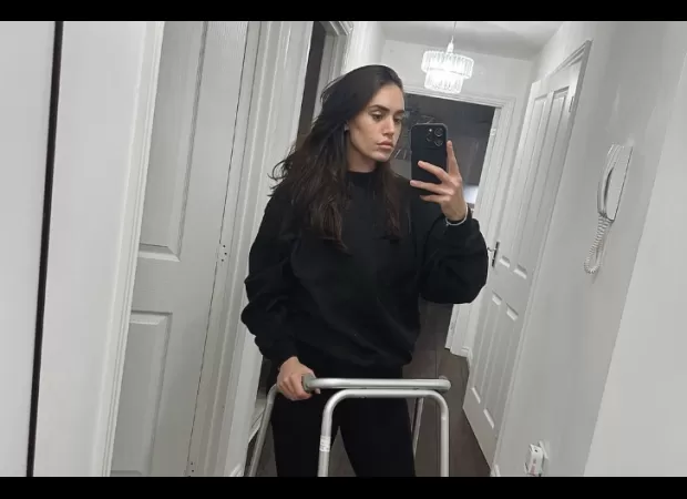 TOWIE star walks for first time in 6 months with zimmer frame after car crash.