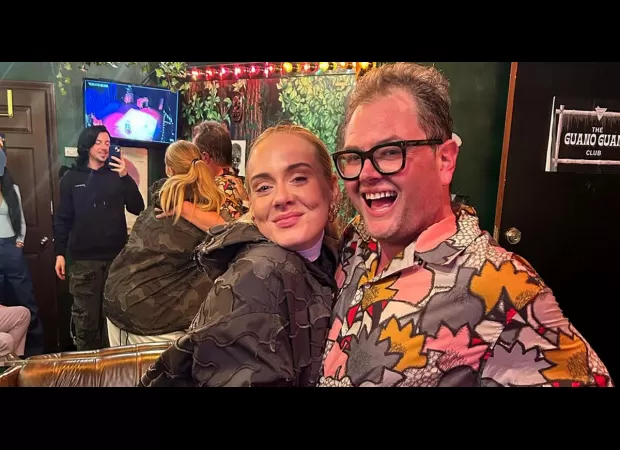 Alan Carr shares photo of Adele, delighting fans.