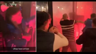 Newcastle fans attacked by PSG fans with thrown chairs and flares into windows.