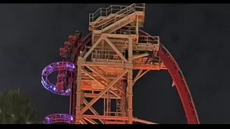 Riders stuck in vertical position on Thanksgiving night on roller coaster.