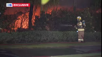 Fire crews contain a fire at a Brisbane golf club.