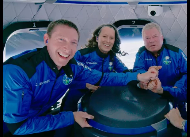 William Shatner urged the world to take climate change seriously after returning from a trip to space.