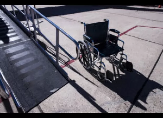 Federal investigation launched after video of airport workers damaging wheelchair goes viral.