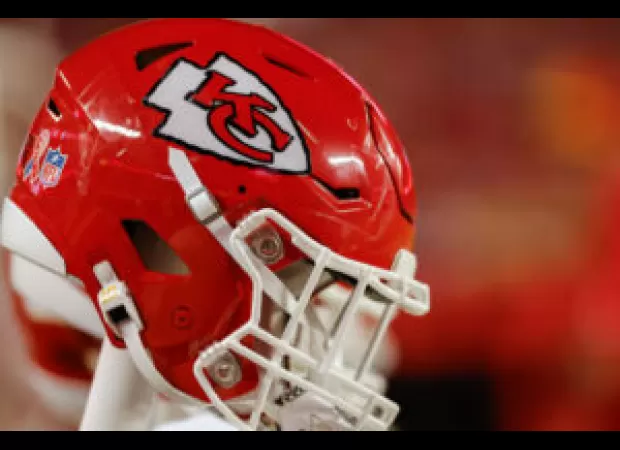 Accusation of racism against young Chiefs fan triggers criticism of sports reporter.