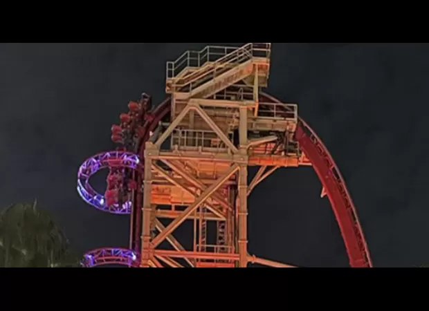 Riders stuck in vertical position on Thanksgiving night on roller coaster.