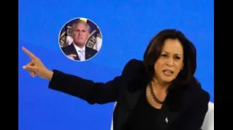VP Harris defends Biden against attacks, standing by his side.