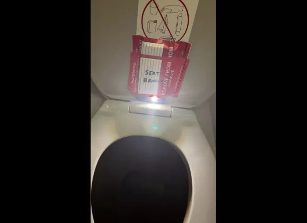 Flight attendant attached iPhone to bathroom wall to capture video of teenage girl.