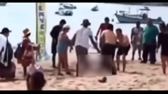 Tourist dies after being attacked by shark, leg amputated in presence of young daughter.