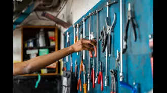 11-year-old black girl in Ghana repairs motorcycles as a mechanic.