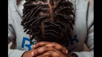 Student suspended for wearing locs in school is in a standoff with school district over policy.