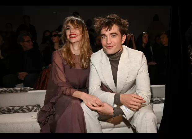 Suki Waterhouse shows off her growing baby bump for the first time, looking radiant.