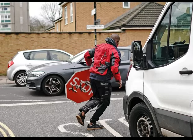 Man apprehended after Banksy's mural taken within an hour of showing up in London's south side.