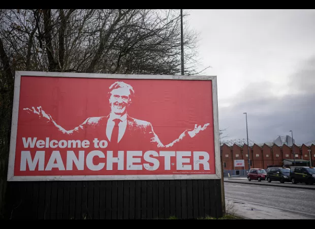 Sir Jim Ratcliffe celebrates his minority takeover of Manchester United, expressing his excitement.