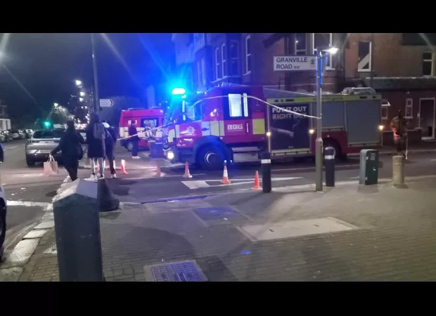 Tory MP's office damaged by fire; police suspect arson.