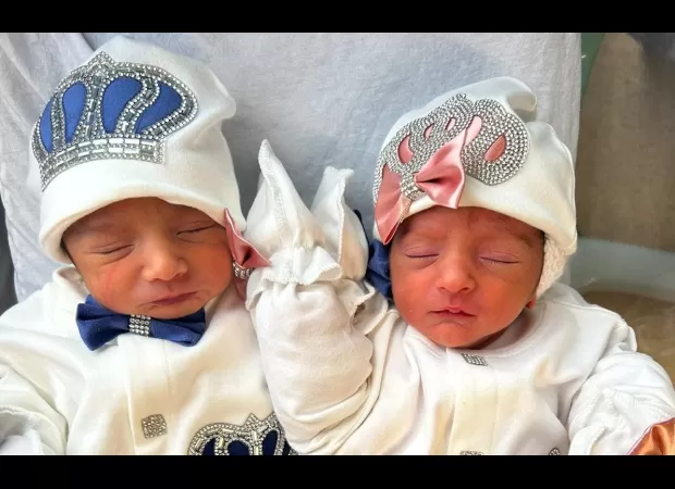 Twins with different birthdays are here to spread Christmas cheer!